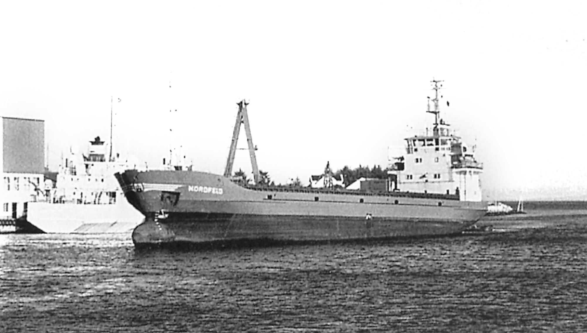 M/S "Nyfjell" 1999 - , Bulk/selvlosser 1976 Levert fra J. J. Sietas KG Schiffswerft GmbH & Co., Hamburg som "Nordfeld" til P/R Nordfeld (Reederei Uwe Jess, Tyskland), Limassol, Kypros. 1896 br.reg.ton., 1269 net.reg.ton., 2970 tdw., 84,18x11,84x5,27 meter - 10-syl 4T EV Alpha-Diesel V23L, 1400 BHK. 1996 Ny 12-syl. Alpha-Diesel på 1750 BHK innsatt. April 1999 Grunnstøtte i tett tåke utenfor Egersund og ble påført store skader og akterskipet sank. Etter unnsettning av slepebåtene "Bamse" og "Gubben" ble skipet lenset og satt på grunn på en sandbanke ved Grunnesund for å hindre at det gikk ned. 1999 Innkjøpt "as is" av Nysand AS (Jakob Einarsen), Sævelandsvik og ankom Skude Verft, Skudeneshavn for reparering og klassefisering den 17. april. 1999 Skipet skal etter fullført maskinreparasjon ved Paulsens motorverksted, Ytralan, settes i fart 14. november under navnet "Nyfjell". Registrert i La Paz, Bolivia.
